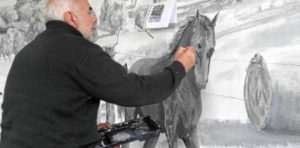 Franco at work on the Sound Shell Mural